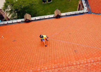 Climbing on Tile Roof for Repair