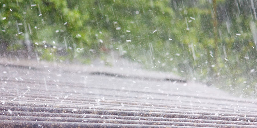Hail Storm With Hailstones Hitting Roof
